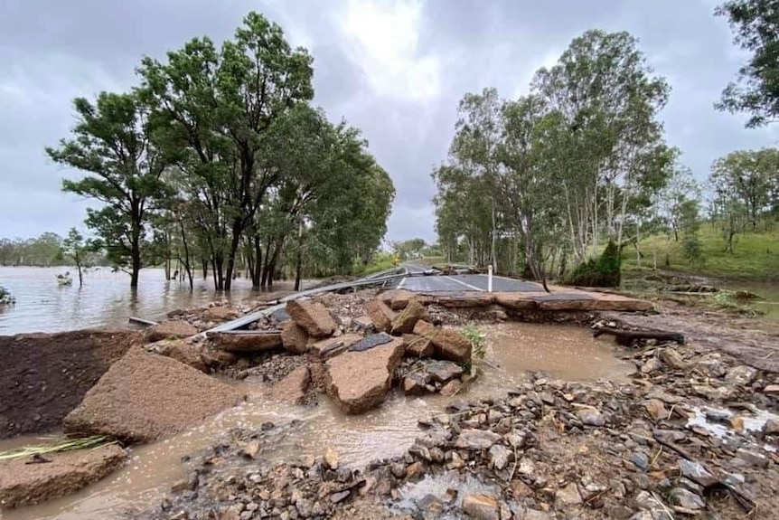 Smashed up Burnett Highway after flooding.