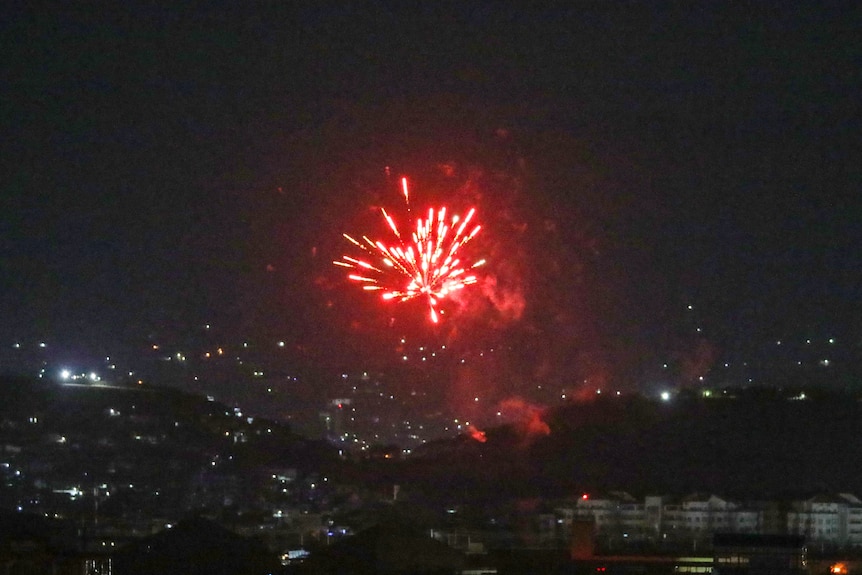 Gun fire lights up the night sky over Kabul.