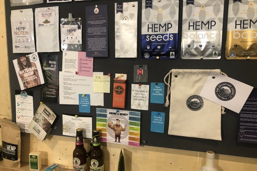 A range of hemp products and pamphlets pinned to a board.