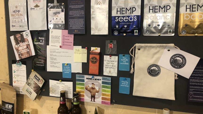 A range of hemp products and pamphlets pinned to a board.