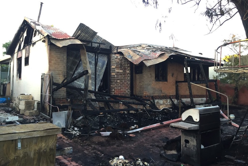 A house gutted by fire in Hamilton Hill with the ceiling collapsed.