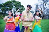 Anil Bhoj (centre) with female dancers from Bindaas Bollywood Dance Company.