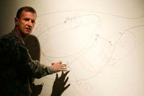 General Stanley McChrystal speaks to the military at the US base Kandahar Airfield December 2, 2009 (Getty Images: Mustafa Qu...