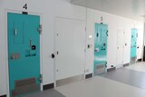 cell doors in a corridor.
