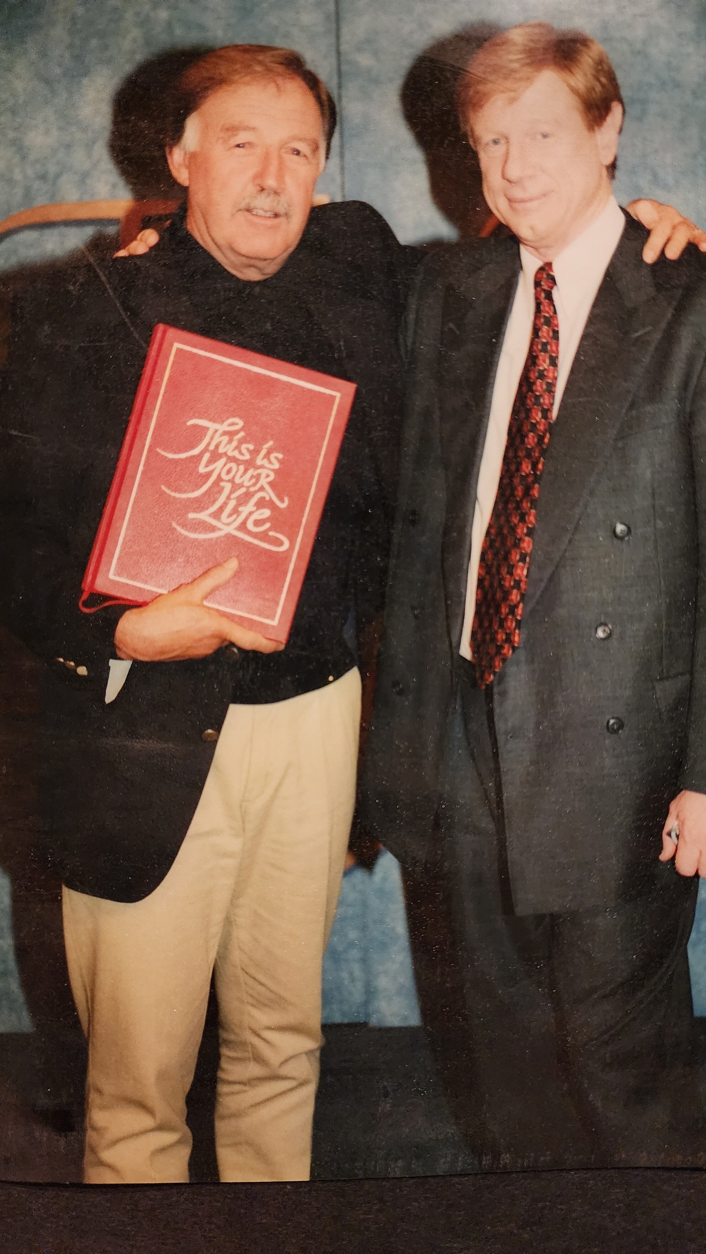 George Negus and Kerry O'Brien standing together on a blue background.