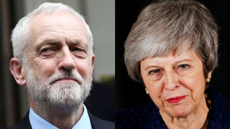 A composite image of Jeremy Corbyn in a blue shirt and red tie and Theresa May in pearls and a navy jacket.