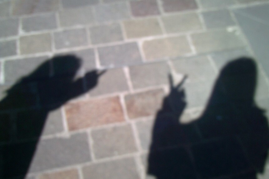 An image of the shadows of two people, taken by a participant in the Name.Narrate.Navigate program.