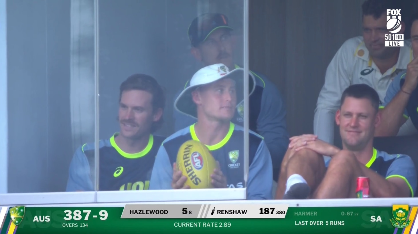 Noah Anderson (left) sits in the Australian cricket rooms during a Test against South Africa.