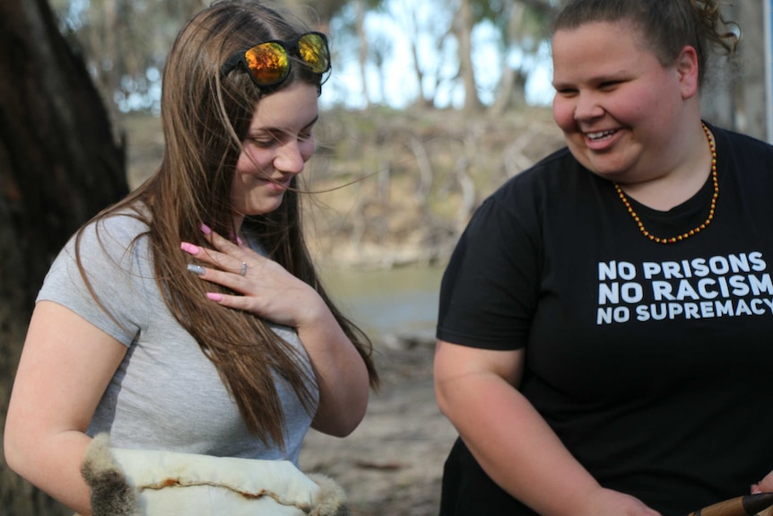 Abbie Webb and Georgia Capocchi-Hunter laughing together at the Mungo Camp