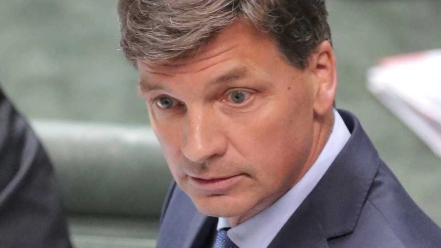 Angus Taylor speaks at the despatch box with Scott Morrison sitting behind him