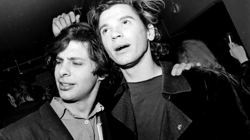 A black and white photo of Richard Lowenstein and Michael Hutchence.