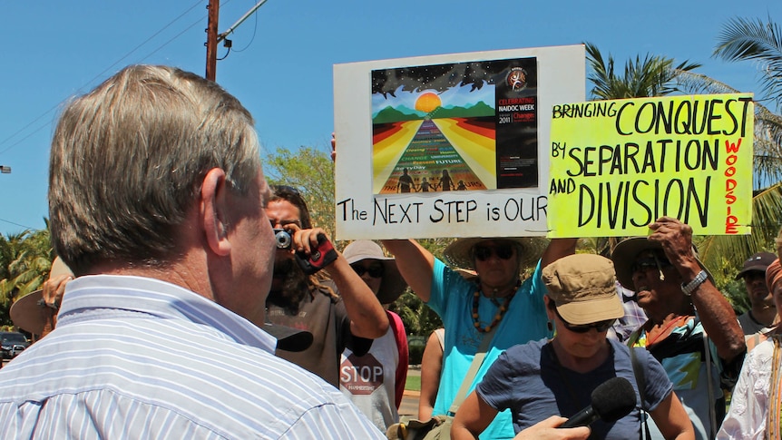 Colin Barnett could not make himself heard as the protesters chanted
