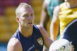 Kangaroos captain Darren Lockyer fires a pass at training