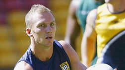 Kangaroos captain Darren Lockyer fires a pass at training