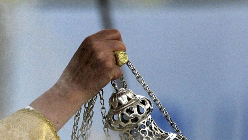 Pope Benedict XVI with swinging incense