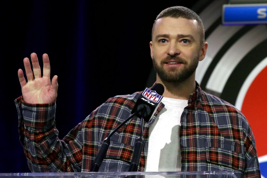 Justin Timberlake answers questions during a news conference