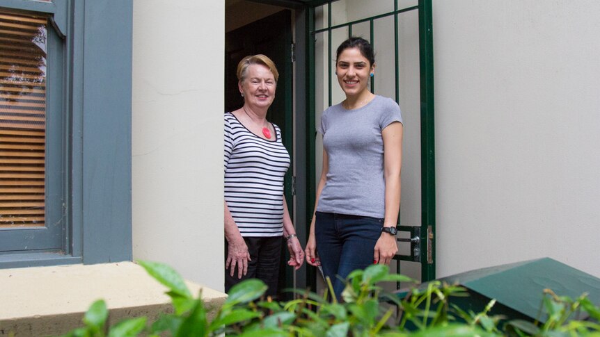 Barbara Squires and student Niloufar Imanriad outside their Redfern home