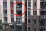 A toddler in China falls six storeys from a balcony.