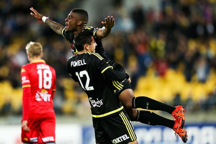 Wellington's Roly Bonevacia celebrates his goal against Adelaide with team-mate Blake Powell.