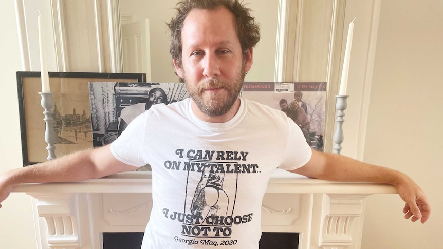 Singer-songwriter Ben Lee wearing a t-shirt that says: "I can rely on my talent, I just choose not to - Georgia Maq - 2020"
