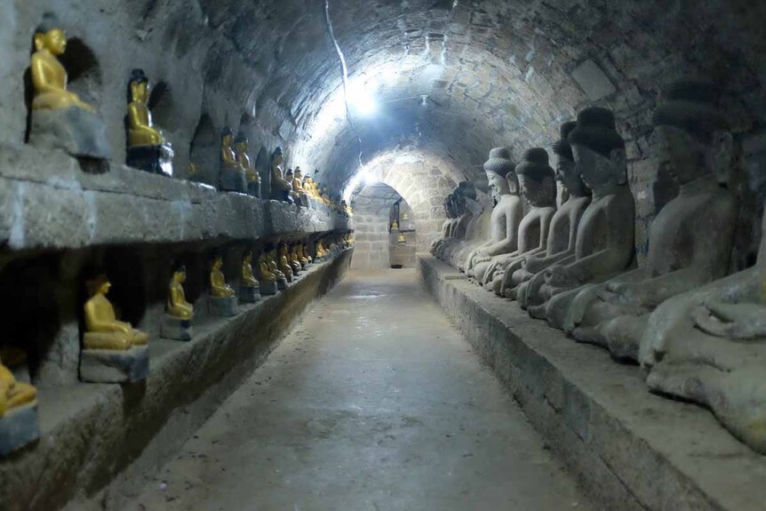 Hundreds of Buddha statues line the ancient brick walls of the Shittaung Pagoda.