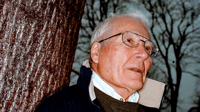 James Lovelock near a tree looking to the side