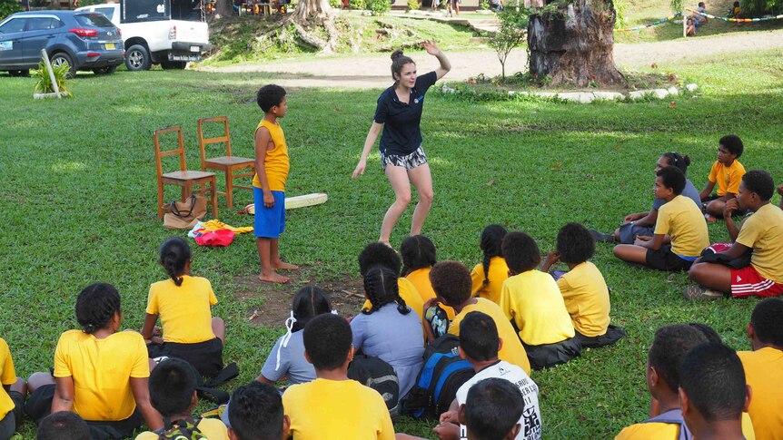 Volunteer Bridget Fasnacht teaches Fijian children water safety
