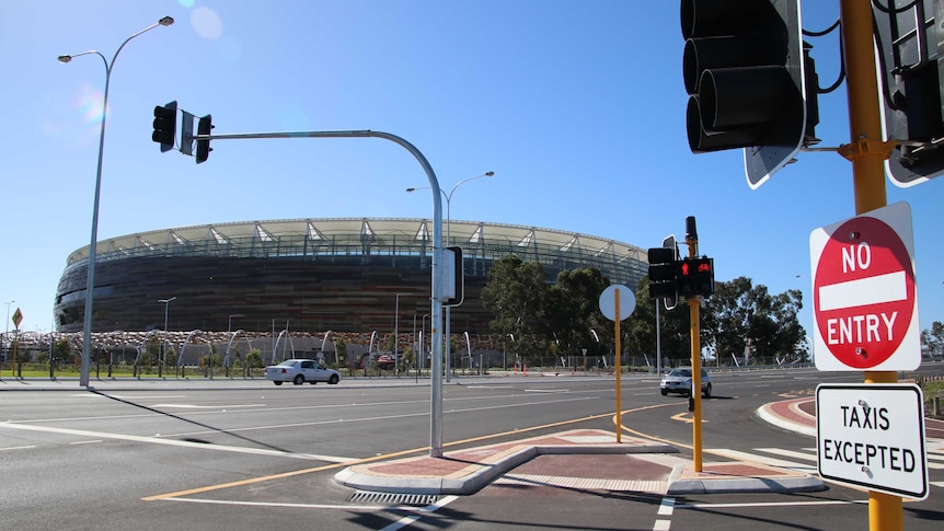 Perth Stadium in the background with a No Entry sign in the foreground.