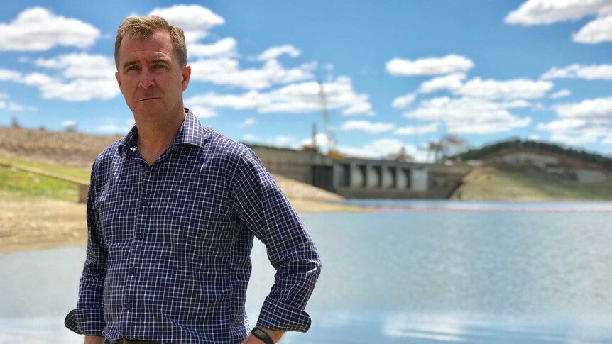 Adrian Langdon stands in front of the Keepit Dam.