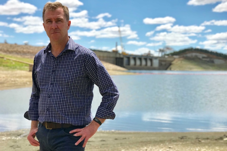 Adrian Langdon stands in front of the Keepit Dam.
