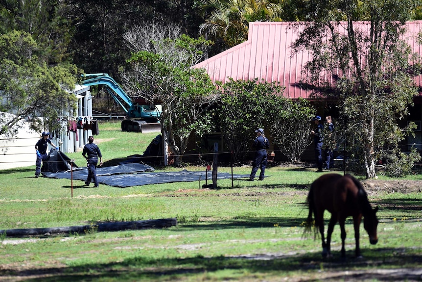 Police examine the foster home of Queensland schoolgirl Tiahleigh Palmer at Chambers Flat