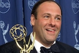 James Gandolfini holds his Emmy.