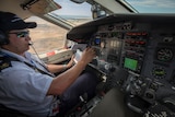 Charleville senior base pilot Nick Tully flying a plane in outback Queensland.