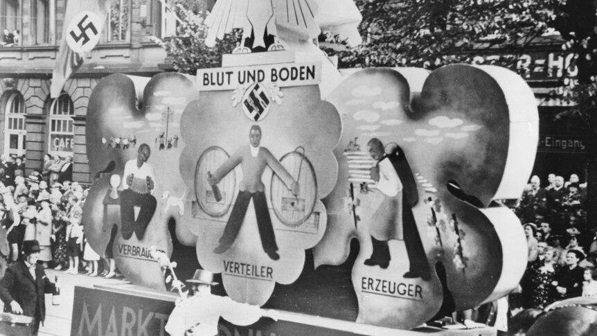 Nazi float with 'Blut und Boden' slogan