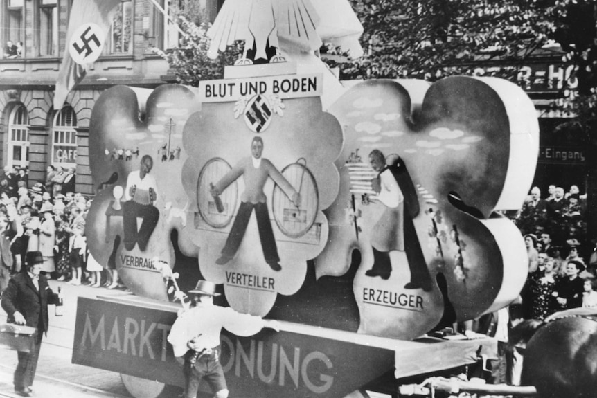 Nazi float with 'Blut und Boden' slogan