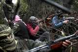 Free Syrian Army gather in the hills of the Idlib province.