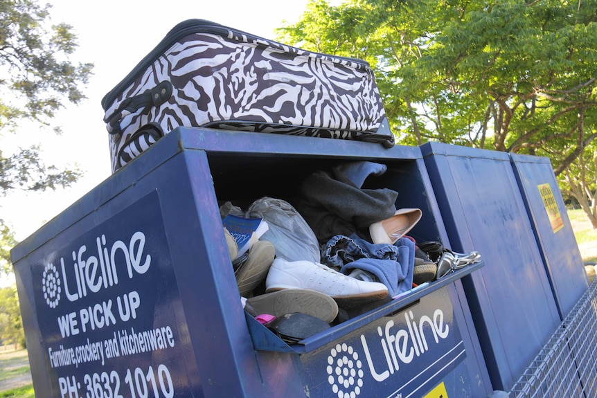 An overflowing Lifeline charity bin at Keperra.