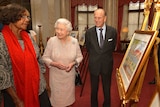 The Queen and Prince Philip talk with Lenie Namatjira, the granddaughter of Aboriginal artist Albert Namajtira