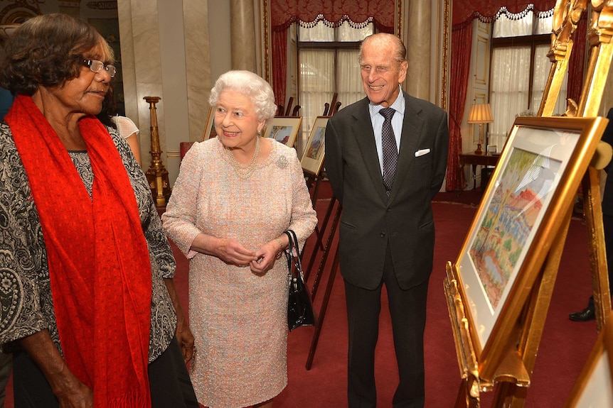 The Queen and Prince Philip talk with Lenie Namatjira, the granddaughter of Aboriginal artist Albert Namajtira