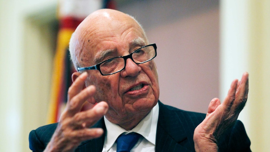 Rupert Murdoch gestures