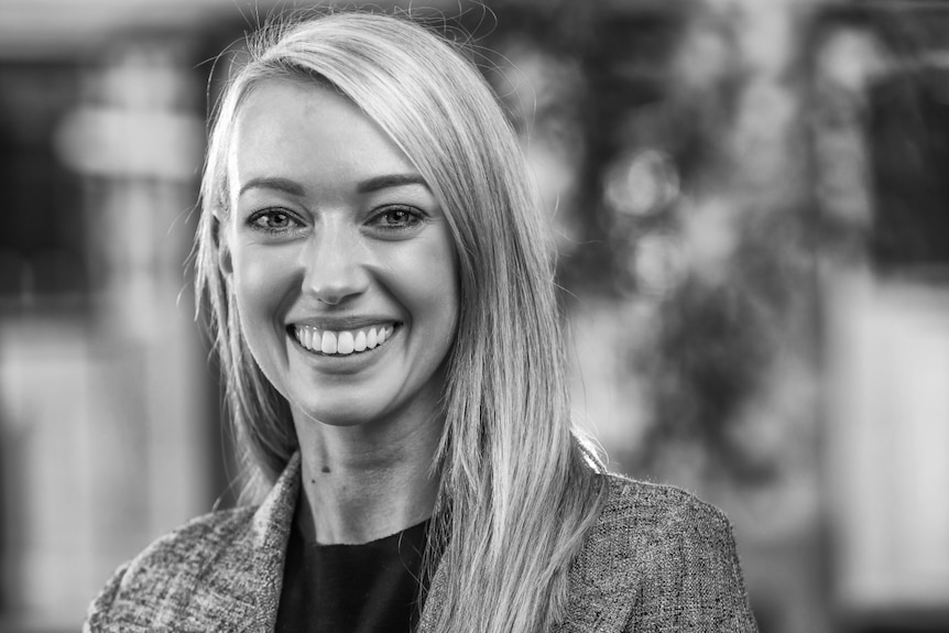 A black and white portrait shot of Naomi Morton