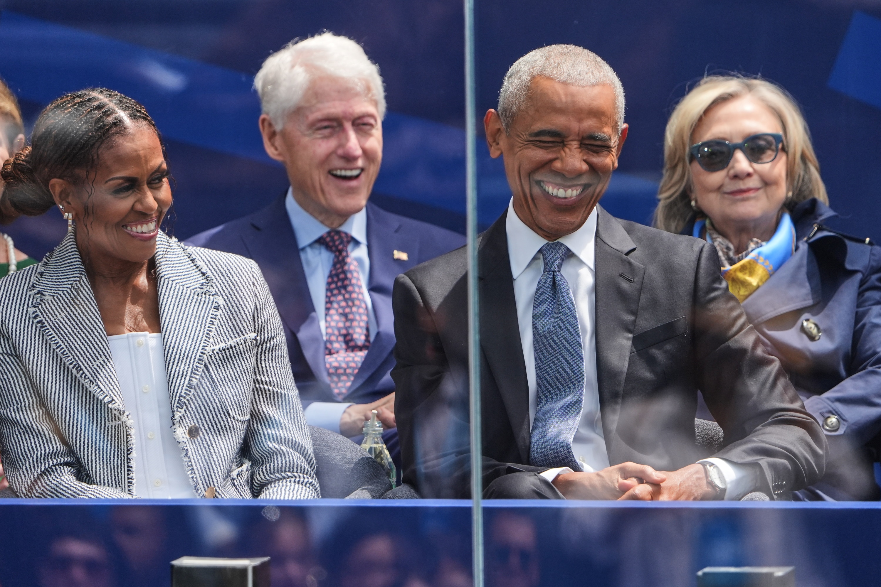 Ex-presidents and stars, but no Trump, turn out for Obama centre