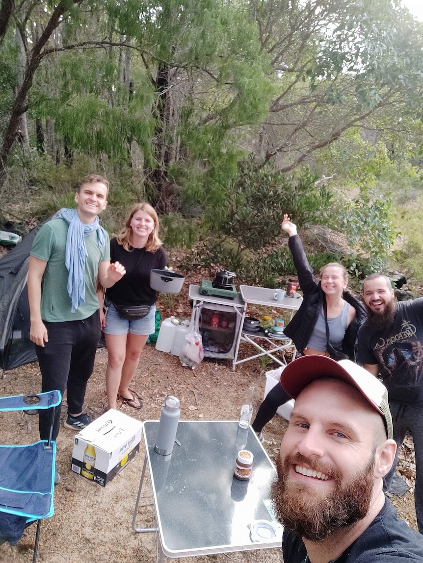 Young people at a bush camp site