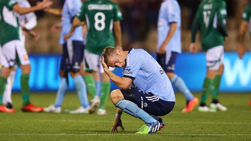 Empty feeling ... Sydney FC's Marc Janko shows his dejection at full-time