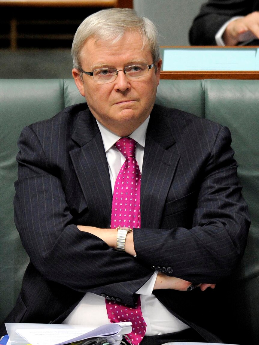Former foreign minister Kevin Rudd listens during Question Time