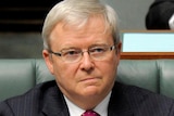 Former foreign minister Kevin Rudd listens during Question Time