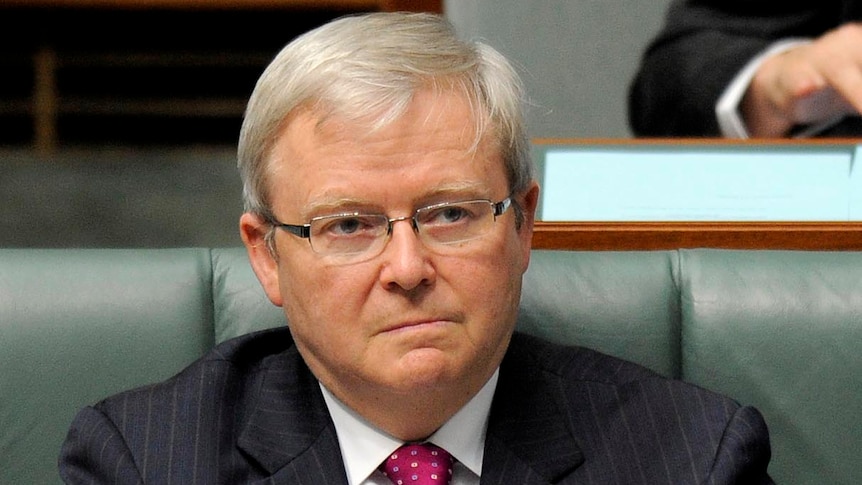 Former foreign minister Kevin Rudd listens during Question Time