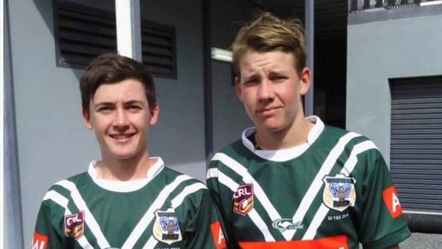 Matt Burton and paddy Haycock as young boys standing next to each other in their  St John's Jerseys 