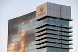 A close-up angled shot of the top floors of Crown Towers Perth.