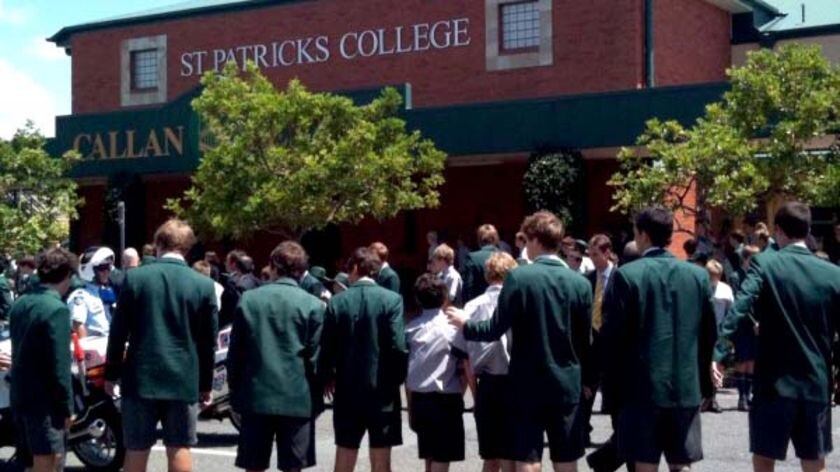 Students form an honour guard outside St Patrick's College, Shorncliffe